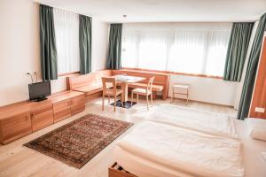 Postel nebo postele na pokoji v ubytování Hotel La Villa
