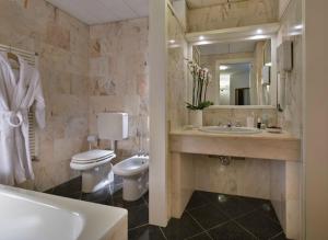 Kúpeľňa v ubytovaní Hotel Lo Zodiaco