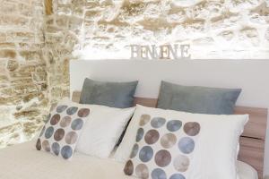 Posteľ alebo postele v izbe v ubytovaní San Nicola Old Town Apartment Casatuabari