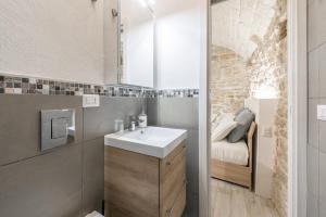 Kúpeľňa v ubytovaní San Nicola Old Town Apartment Casatuabari