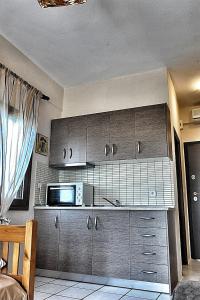 Gallery image of Palm Tree Apartments in Psakoudia