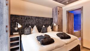 Posteľ alebo postele v izbe v ubytovaní Mountain Spa Residences