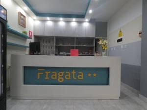 a reception area of a hospital with a fireidad sign at Fragata Camaná in Camaná