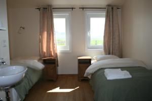 Voodi või voodid majutusasutuse Guesthouse Vellir toas