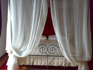Postel nebo postele na pokoji v ubytování B&B in Arena L' Opera