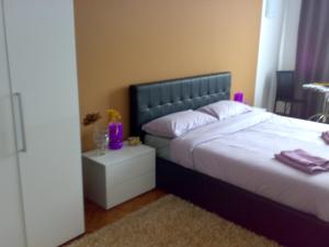 Postel nebo postele na pokoji v ubytování B&B in Arena L' Opera