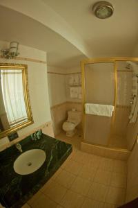 Koupelna v ubytování Hotel Oro Inn