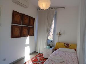 Postel nebo postele na pokoji v ubytování B&B Casa Cantoniera