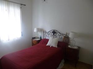 מיטה או מיטות בחדר ב-Casa de Santana