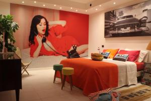 A bed or beds in a room at Incantevole appartamento anni 50'