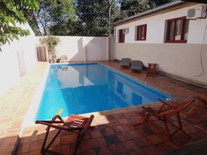 The swimming pool at or close to Hotel Tierra Colorada