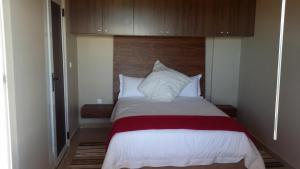 Łóżko lub łóżka w pokoju w obiekcie Ponta View Hotel