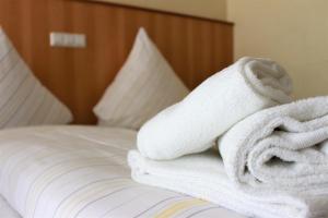 מיטה או מיטות בחדר ב-Hotel America
