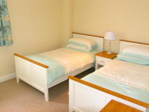 Ένα ή περισσότερα κρεβάτια σε δωμάτιο στο Dairy Apartment 1