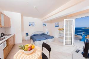 Kuchyň nebo kuchyňský kout v ubytování Creta Hotel
