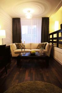 Area soggiorno di First Hotel Witt