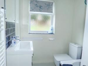 Koupelna v ubytování Amelia Cottage + 12 fotografií