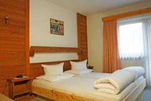 Katil atau katil-katil dalam bilik di Pension Ötztalerhof