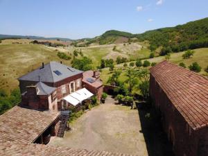 an aerial view of a house in a field at Domaine Sermet in Calmels-et-le-Viala