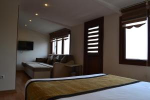 Postel nebo postele na pokoji v ubytování Seven Days Hotel - İstanbul