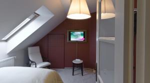 Giường trong phòng chung tại Residence Arx & Wellness
