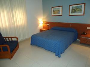 Postel nebo postele na pokoji v ubytování Hotel Mar Menor