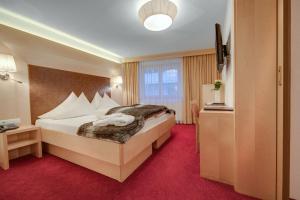 Posteľ alebo postele v izbe v ubytovaní Hotel Albona