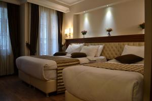 Postel nebo postele na pokoji v ubytování Seven Days Hotel - İstanbul