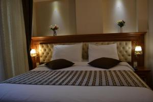 Postel nebo postele na pokoji v ubytování Seven Days Hotel - İstanbul