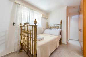 Posteľ alebo postele v izbe v ubytovaní Villa Maria Beachfront Residence + 20 fotografií