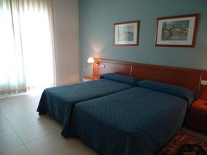 Postel nebo postele na pokoji v ubytování Hotel Mar Menor + 35 fotografií