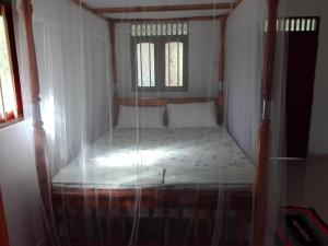 Postel nebo postele na pokoji v ubytování Calm Garden Cabanas