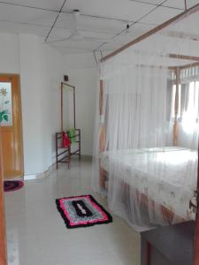 Postel nebo postele na pokoji v ubytování Calm Garden Cabanas