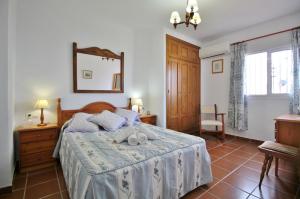 Posteľ alebo postele v izbe v ubytovaní Villa Cornocalejo SpainSunRentals 1003