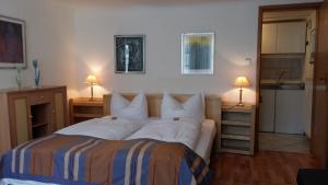 Postel nebo postele na pokoji v ubytování Hotel Goldener Anker