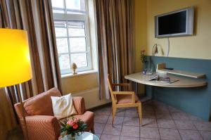 TV a/nebo společenská místnost v ubytování Hotel Goldener Anker