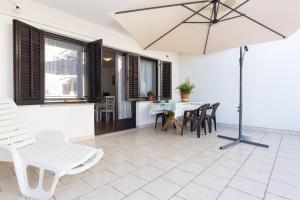 Patio nebo venkovní prostory v ubytování Apartments Karen