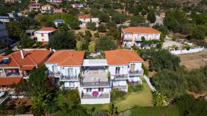 an aerial view of a house with orange roofs at Summer Dream in Vlachata