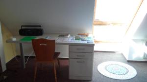 Kuchyň nebo kuchyňský kout v ubytování Apartment unterm Dach