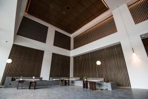 a large room with tables and large windows at KL Sentral Bangsar Suites (EST) by Luxury Suites Asia in Kuala Lumpur +76 photos