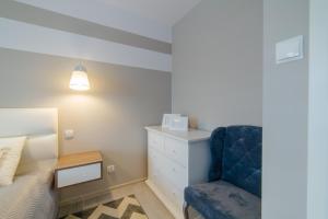 Posteľ alebo postele v izbe v ubytovaní DP Apartament Polanki Park