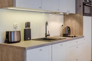 Kuchyňa alebo kuchynka v ubytovaní DP Apartament Polanki Park