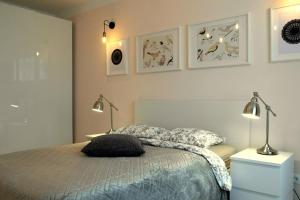 Posteľ alebo postele v izbe v ubytovaní Apartament MODERN SCANDI Waszyngtona