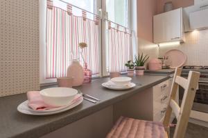 Kuchyňa alebo kuchynka v ubytovaní Apartament MODERN SCANDI Waszyngtona