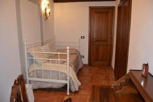 Posteľ alebo postele v izbe v ubytovaní Sweet Cortona