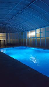 Der Swimmingpool an oder in der Nähe von casa luxury 2 nudista
