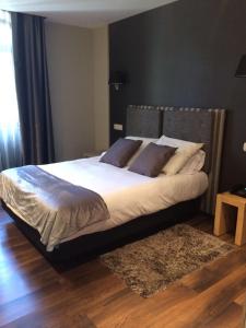 
Cama o camas de una habitación en Hotel Xana Cecos

