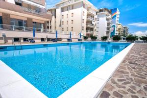 Bazén v ubytování Sea view apartment with swimming pool nebo v jeho okolí