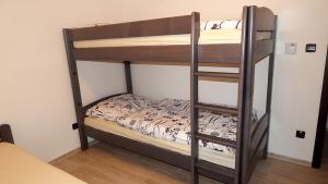 Ένα ή περισσότερα κρεβάτια σε δωμάτιο στο Apartmány Andrea