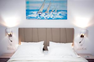Krevet ili kreveti u jedinici u objektu Aegean Horizon Beachfront Villas